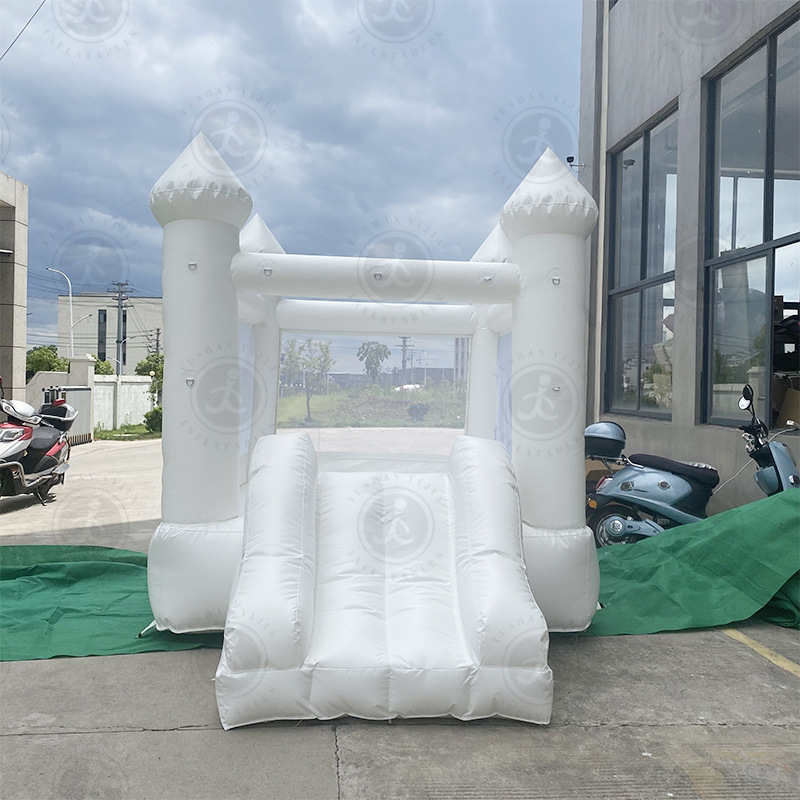 White children inflatable slide trampoline celebration wedding…