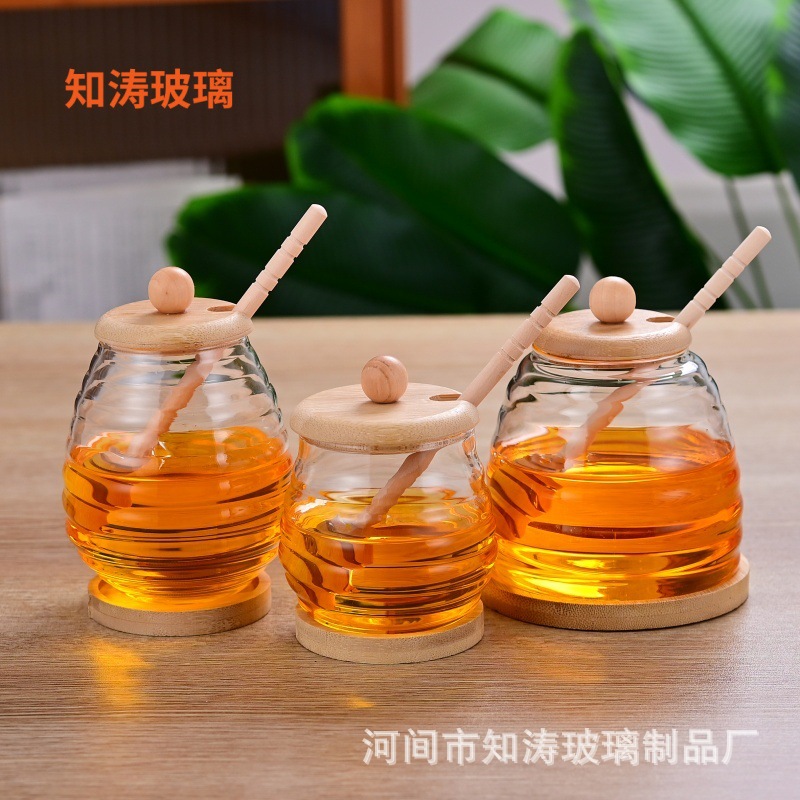 Wholesale glass honey jar with mixing stick creative transparent honey bottle storage jar with lid simple jam bottle