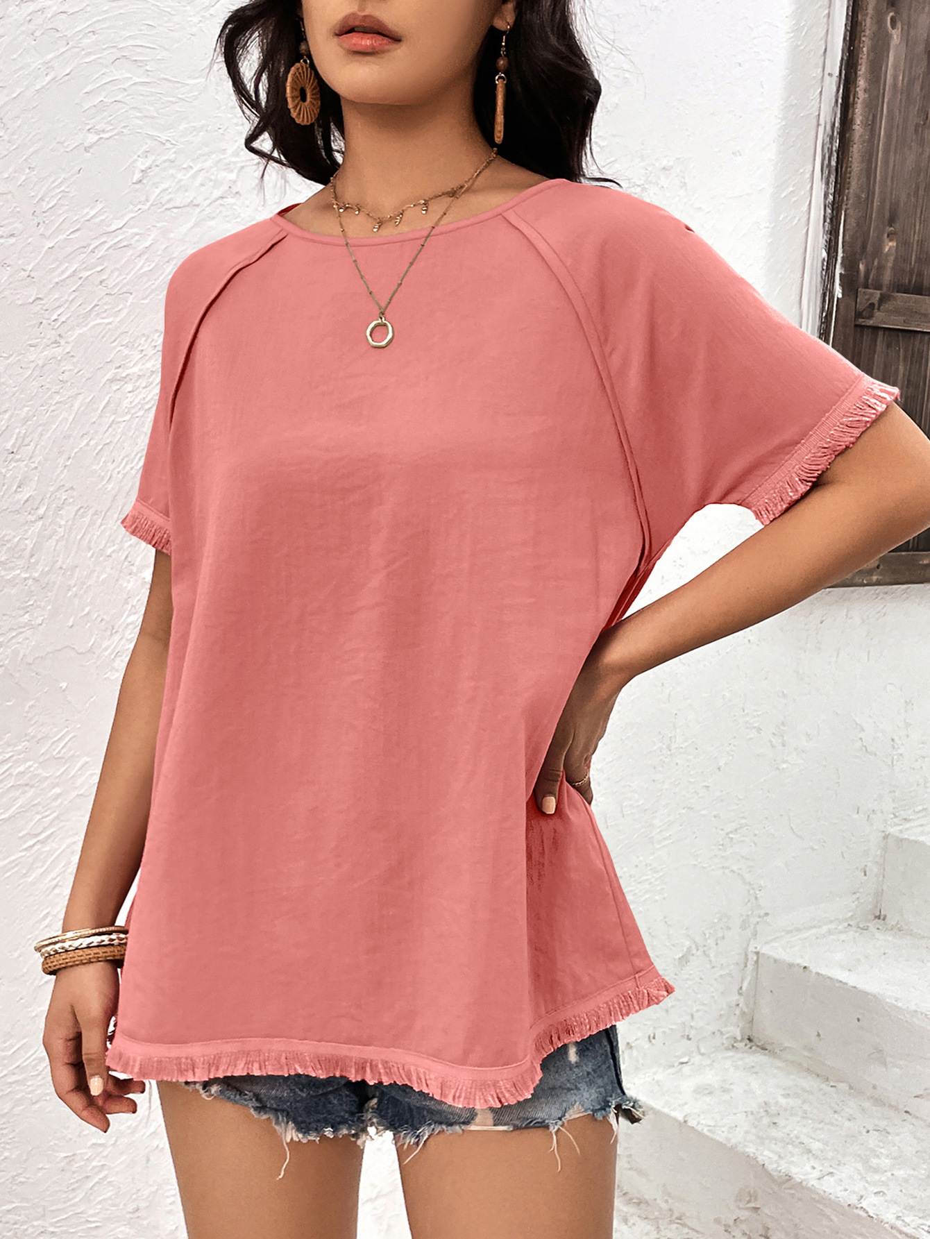 Top casual ampio con scollo tondo e frange da donna_voghion.com