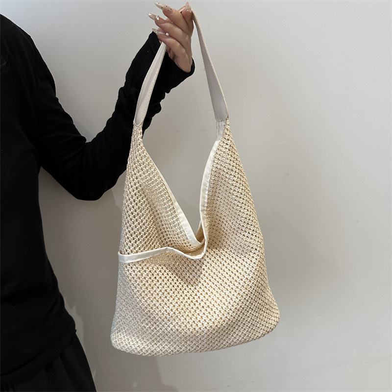 Bolsos de gran capacidad simples para mujeres 2024 nueva moda versátil bolsas de hombro casuales tejidas bolsas de playa para mujeres