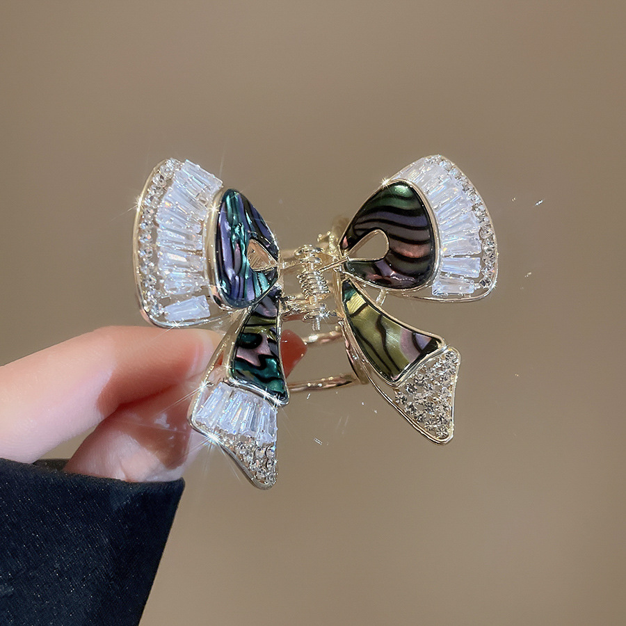 Zircon Fritillaria Horquilla de mariposa de doble capa Temperamento exquisito de alta calidad Clip de tiburón en la parte posterior de la cabeza Clip de agarre de moda Accesorios para el cabello femenino