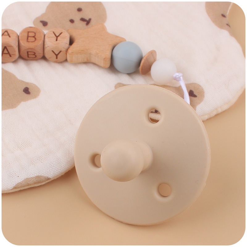 Nuevo bebé Beech dibujos animados oso chupete cadena calmante bebé chupete de silicona a prueba de mordedura cuerda de dos piezas