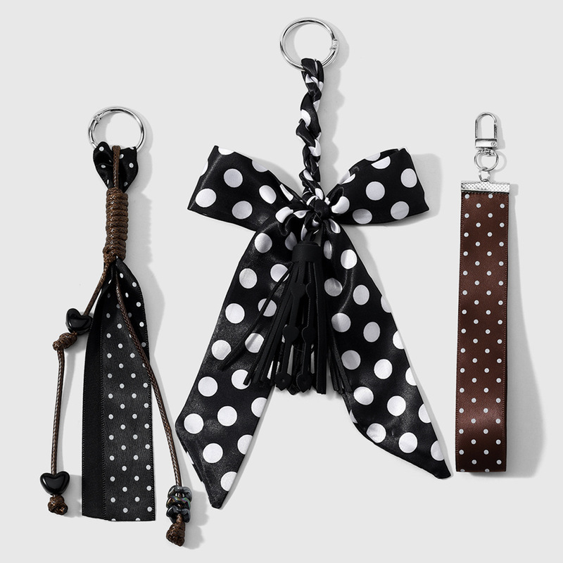 Unique retro-style, classic, multi-colored polka dot wristband, silk scarf, bow, tassel, leather cord, keychain, and bag charm