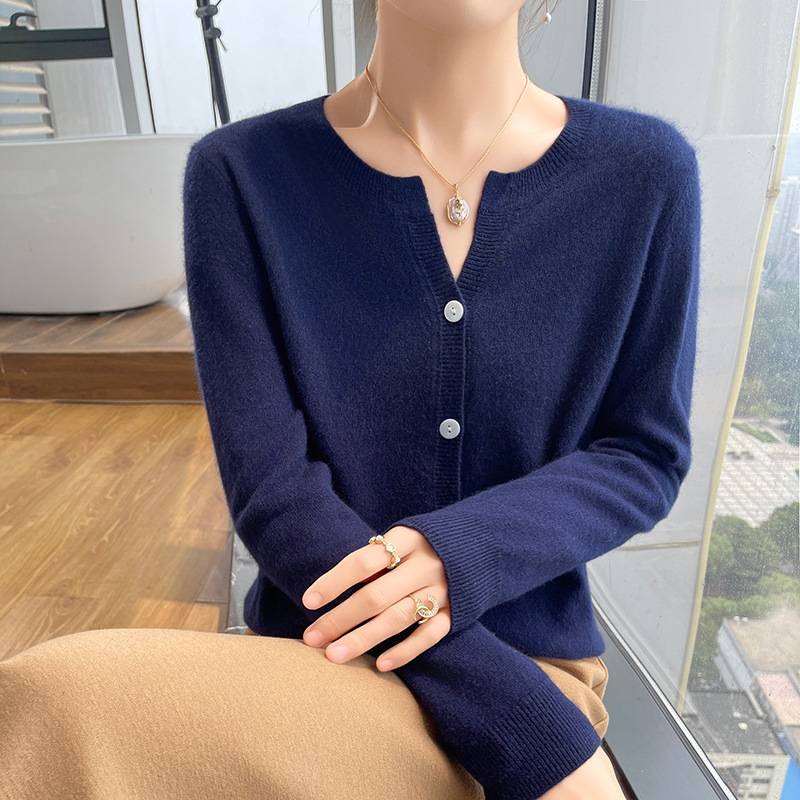 Demi-season knitted cardigan with a round collar