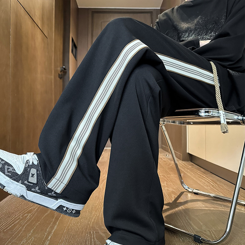 Pantalones de banda de tejido espesa de veludo para hombres pantalones de cauda vertical holgados, pantalones casuales de moda estadounidenses de otoño y invierno