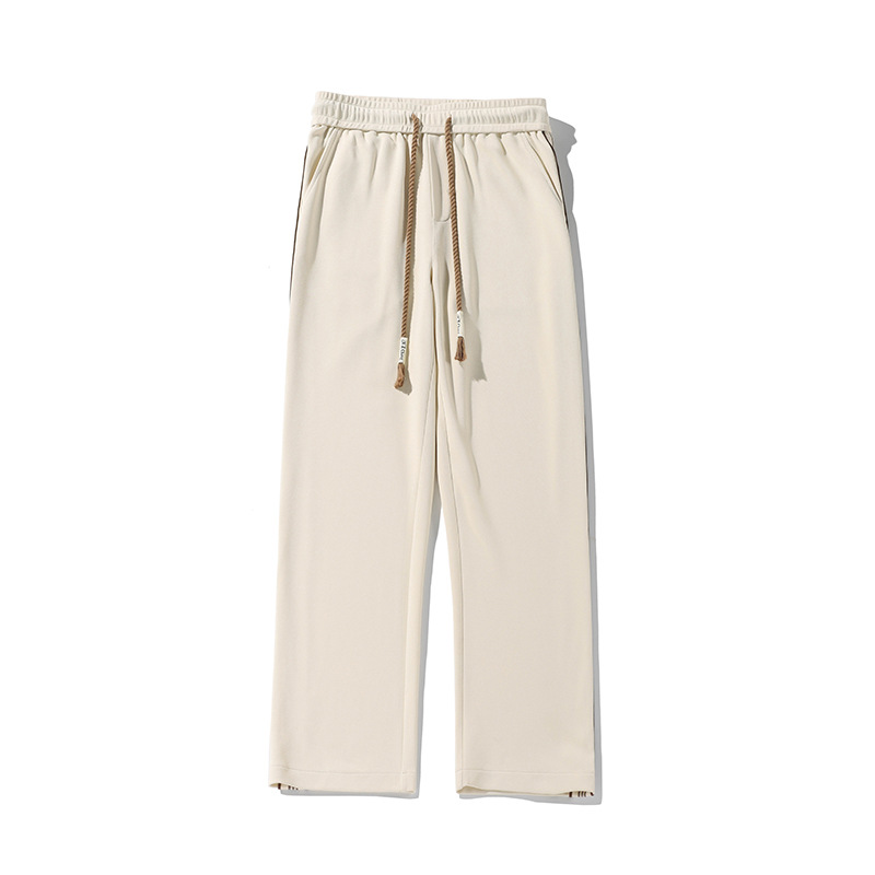 Pantalones de banda de tejido espesa de veludo para hombres pantalones de cauda vertical holgados, pantalones casuales de moda estadounidenses de otoño y invierno