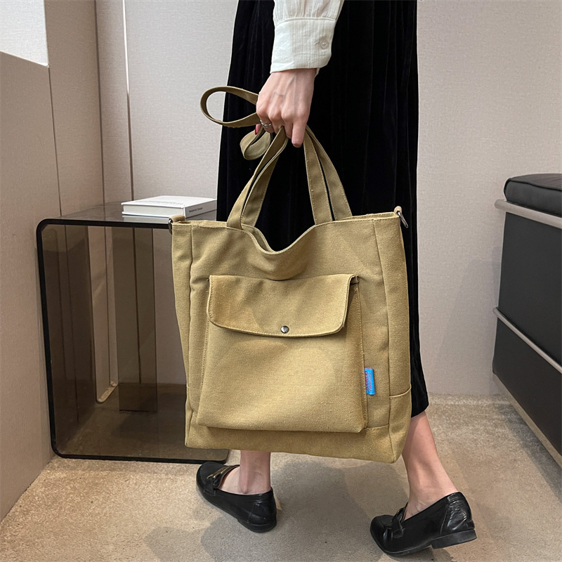 Los fabricantes venden al por mayor el nuevo bolso Tote para mujer bolso de lona de color sólido de gran capacidad bolso de mensajero de hombro casual de moda simple