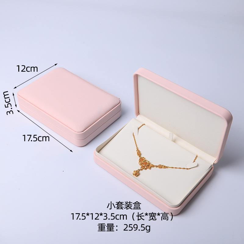 Caja de joyería rosa de alta calidad de cuero pu caja de embalaje de marca de joyería logotipo colgante pulsera collar caja de anillo