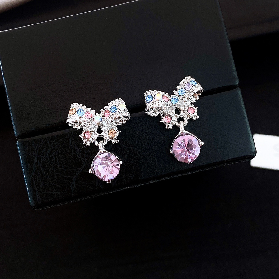 Pendientes de perlas asimétricas con cuernos de diamantes súper parpadeantes de plata Pendientes de nicho de viento frío femenino Pendientes de lujo ligero de alta calidad
