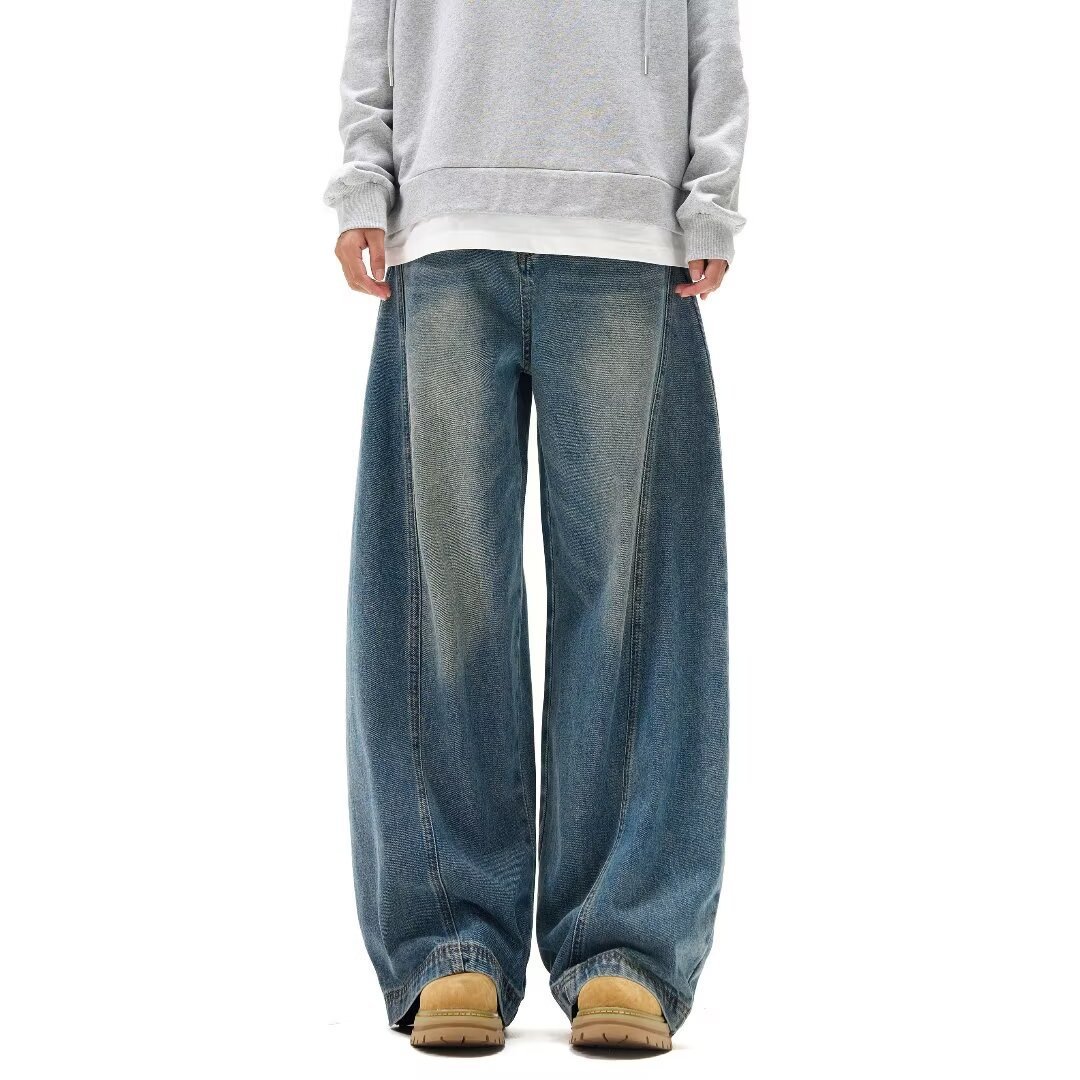 Vaqueros de cimitarra con costuras retro americano para hombres pantalones sueltos de pierna ancha guapos de gran tamaño deconstruidos de pierna ancha drapeados