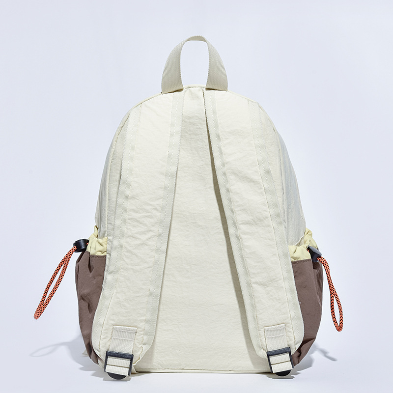 Nueva mochila de viaje al aire libre ligera para estudiantes universitarios mochila escolar pequeña simple versión coreana de color en contraste mochila fresca pequeña