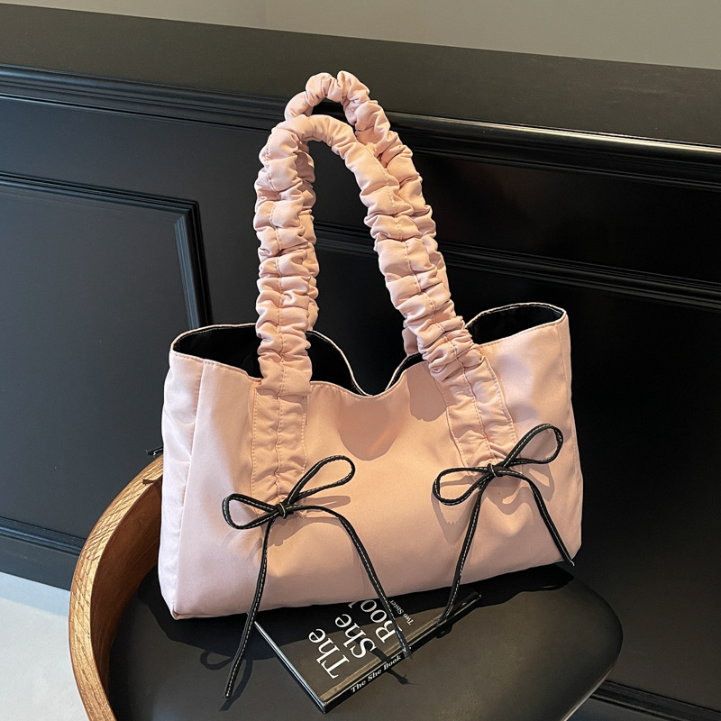 Bolsos de arco de textura de alta calidad, bolsas de nylon de alta capacidad, damas 2025, bolsas de moda, bolsas de nylon casuales de gran capacidad