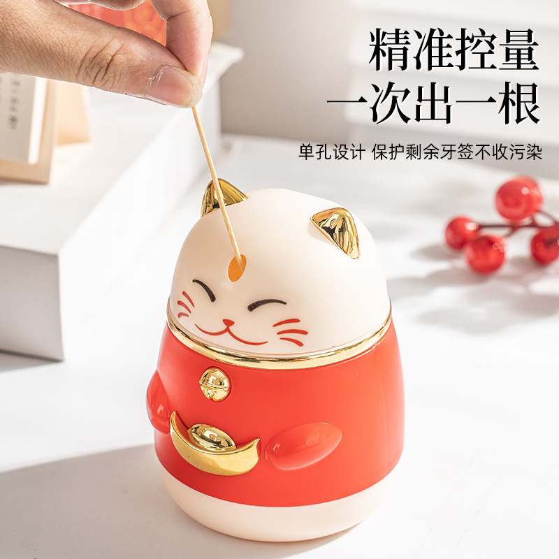 Año Nuevo Gato Presione palillos de dientes caja de palillos de dientes salón de alto valor de cara emergente caja de palillos de dientes de dibujos animados de moda nacional palillos de dientes lata