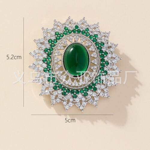 Antique-style copper Victoria emerald gem brooch, plated with 16K gold, featuring a beehive pattern with pigeon egg zirconia.