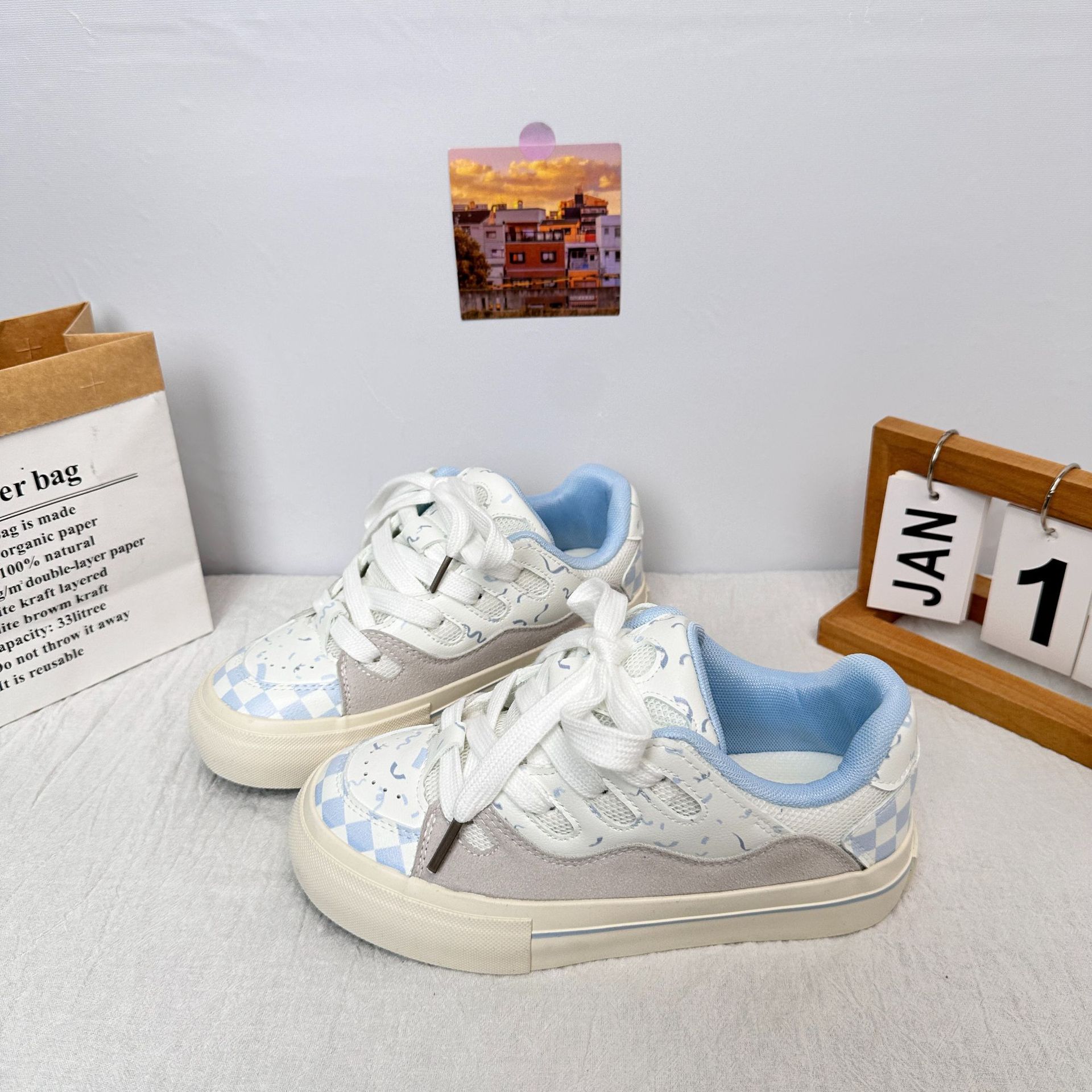 Zapatos de pan de onda lejana, arándano blanco, combinación de colores inteligente, zapatos de lona de moda de todo fósforo, zapatos de skate de moda nacional de corte bajo retro