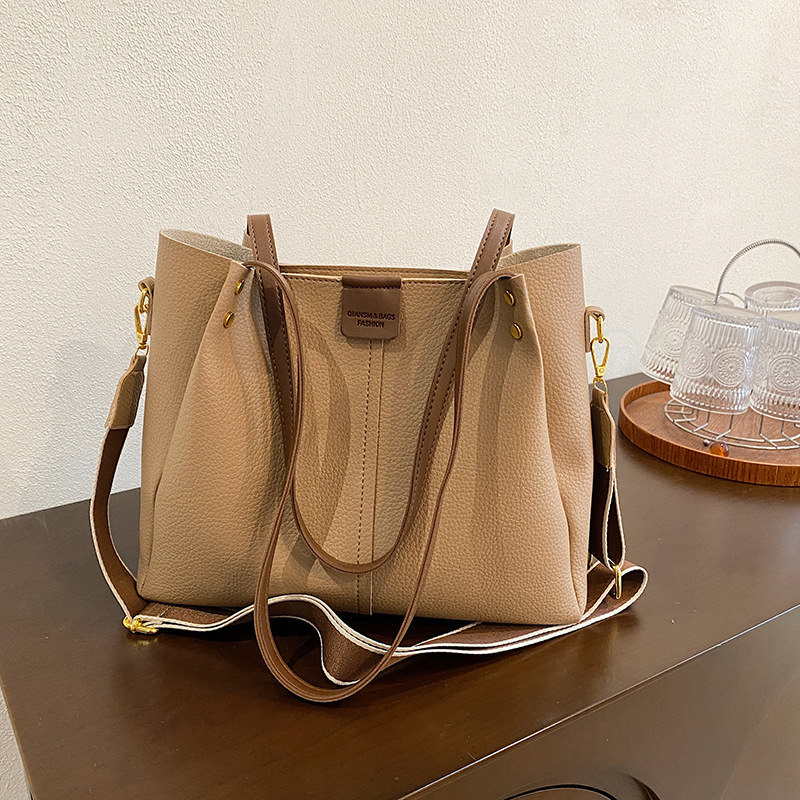 Bolsa de viaje de moda simple para mujeres 2024 nueva gran capacidad versátil bolso de hombro retro bolso de viaje