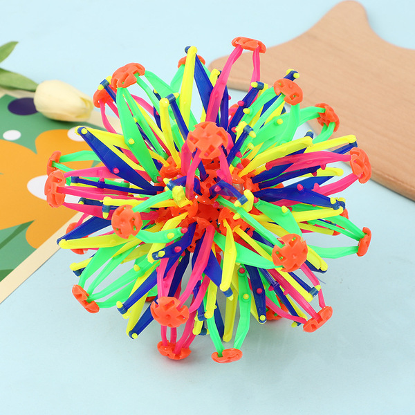 Children's magic telescopic ball player grabs and kicks the flower…