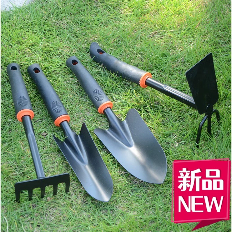Набор небольших садовых инструментов для посадки цветов и овощей, включая лопату, садовую мотыгу, грабли, маленькую лопатку для прополки и лопату.