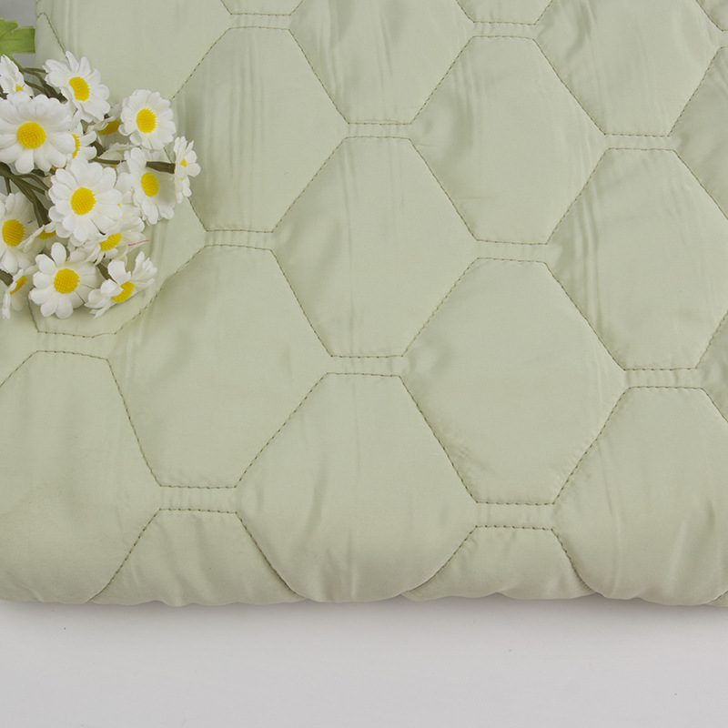 300T春亚纺有线绗缝厚实仿丝棉高挡冬装保暖柔软丝棉服装面料