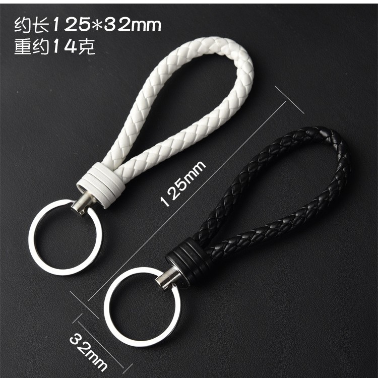 Cuerda de cuero llavero pareja llavero coche creativo tejido a mano hombres y mujeres llavero pequeño regalo al por mayor