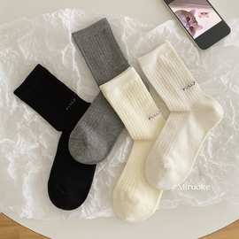 25年秋冬款米若克565纯色字母中筒条纹简约无骨缝合女士袜子批发