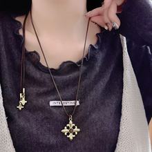 甜美少女鸢尾花抽拉项链女小众长款皮绳毛衣链复古简约轻奢卫衣链