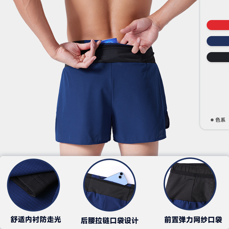 Nuevo verano falso de dos piezas corriendo pantalones cortos deportivos de secado rápido Baloncesto de los hombres maratón de fitness entrenamiento todoterreno pantalones de tres puntos