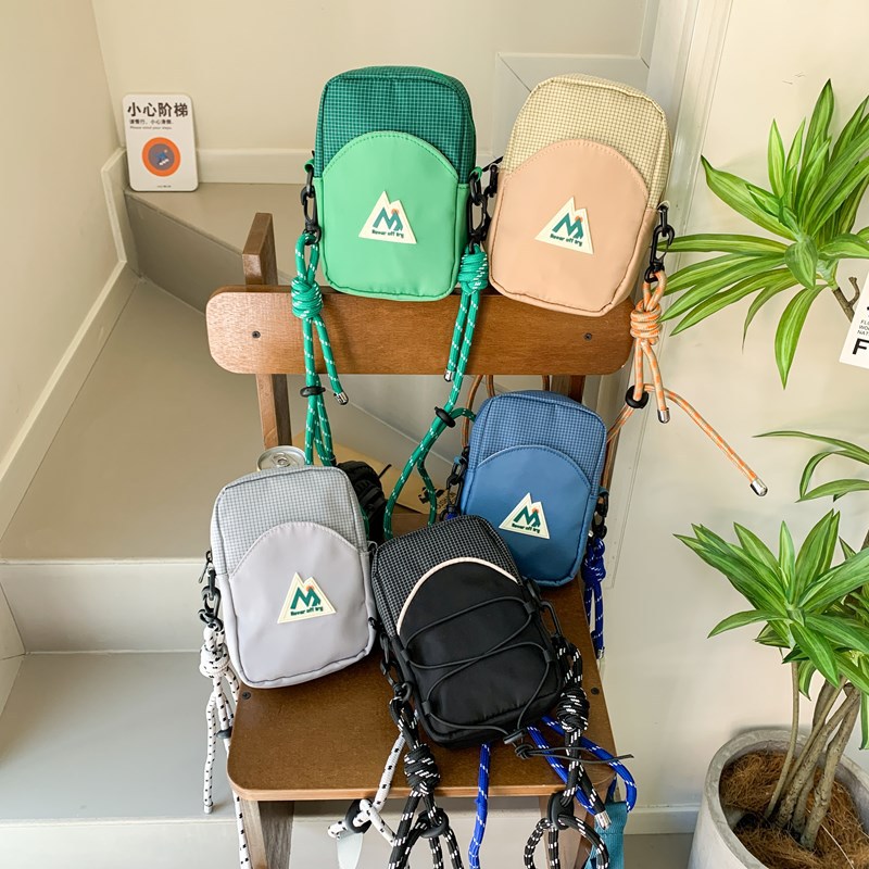 Bolsos para niños coreanos Mini estilo occidental Bolsos de hombro para niños y niñas de color de contraste populares Bolsos de mensajero de viaje ligero