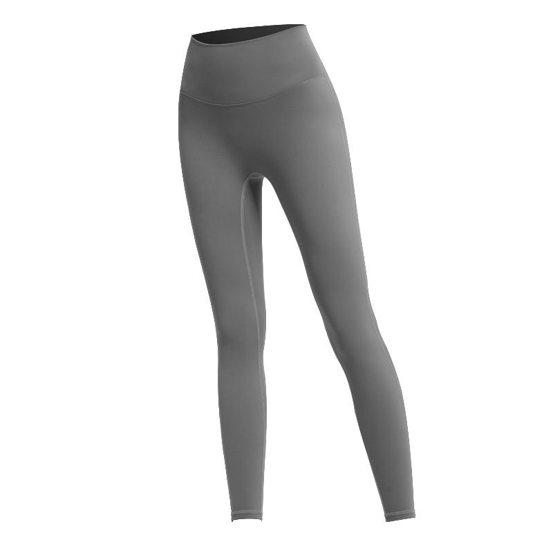 Nuevos pantalones de yoga de cintura alta de melocotón europeo y americano pantalones de barbie de deportes ajustados de las mujeres pantalones de fitness de secado rápido