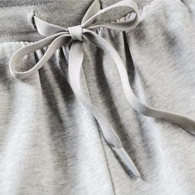 Pantalones cortos masculinos de Nueva tendencia, pantalones cortos casuales de moda, pantalones de algodón de cintura media, pantalones de cintura media de color sólido, impresión al por mayor de la fábrica de pantalones juveniles micro - bomba