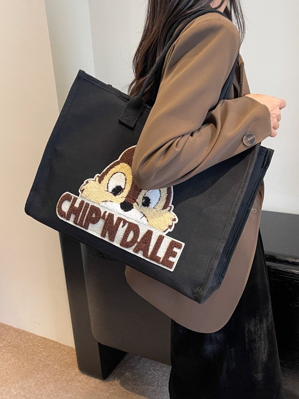Bolsa de lona de gran capacidad para mujeres 2025 nuevo estilo urbano minimalista de moda de dibujos animados portátil de hombro para viajar bolsa