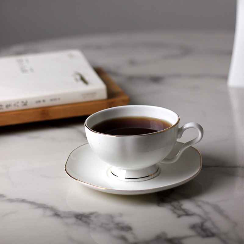 Solid color bone china coffee cup suit British afternoon tea cup European coffee milk tea cup saucer home coffee cup Solid color bone china coffee cup suit British afternoon tea cup European coffee milk tea cup saucer home coffee cup