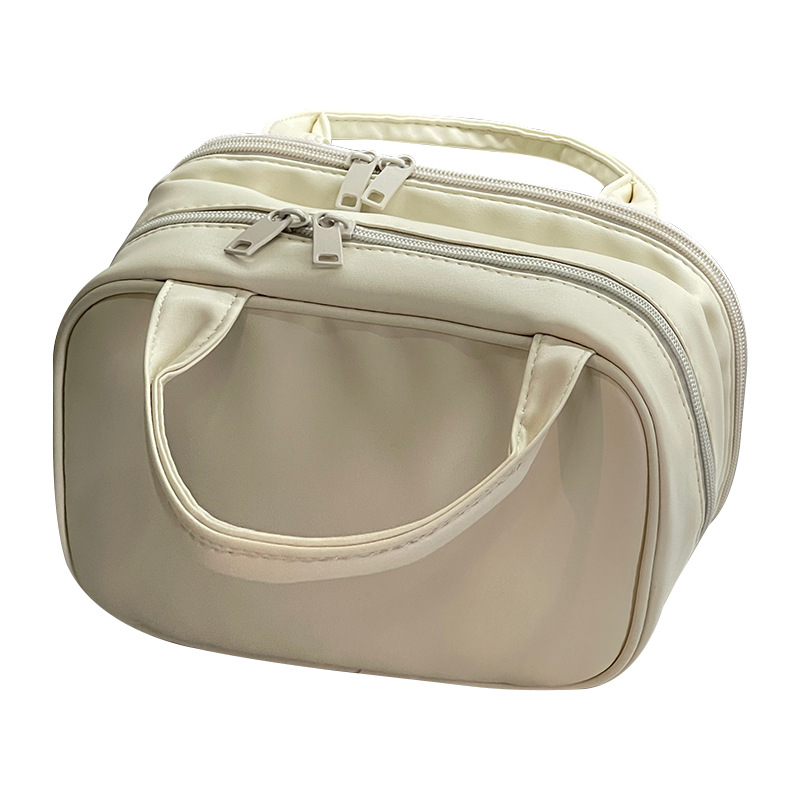 2024 nueva bolsa de maquillaje portátil PU de viaje portátil bolsa de almacenamiento de doble capa de gran capacidad bolsa de alta calidad