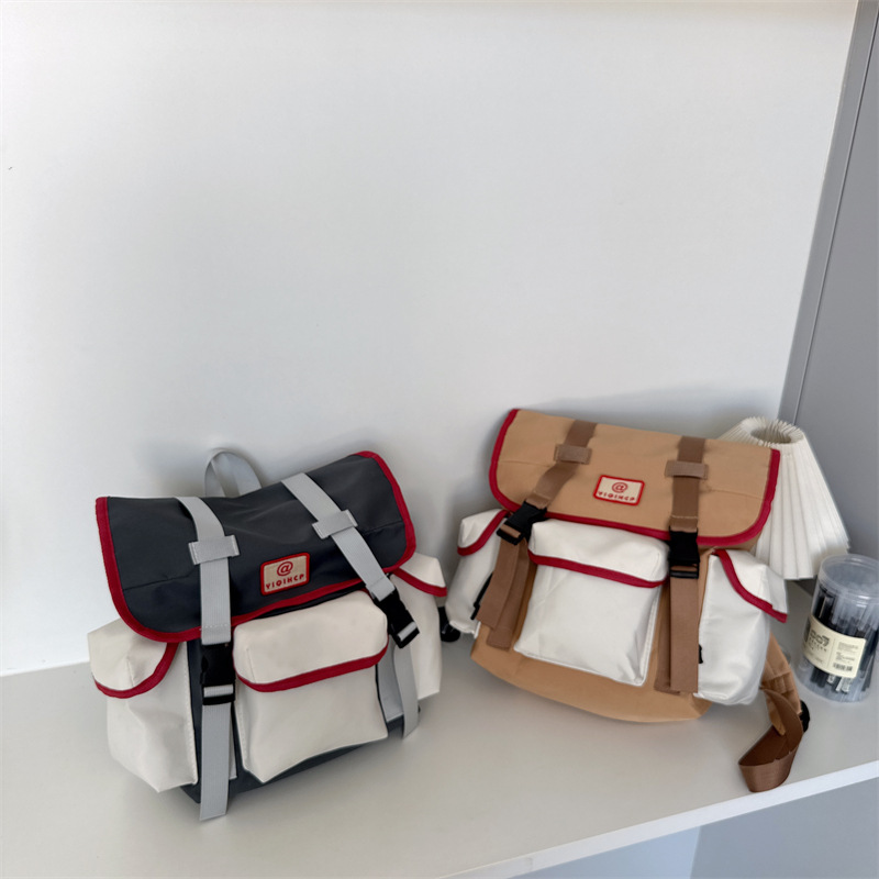 Mochila escolar para estudiantes de escuela primaria versión coreana de la mochila de deportes al aire libre de moda y fresca para niños