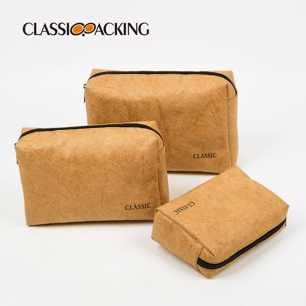 Bolsa de almacenamiento de papel DuPont de tres piezas al por mayor de fábrica Bolsa de cosméticos impermeable resistente al desgaste multifuncional simple con logotipo impreso