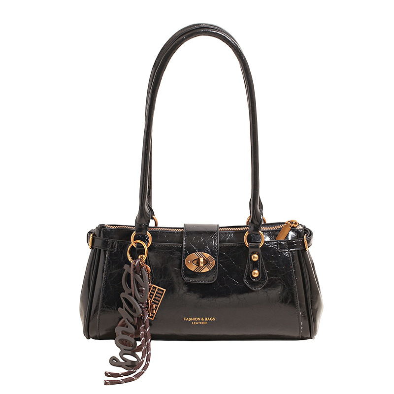 Bolsa de brazo de viaje coreano, bolso de cera retrógrada para mujeres, bolso de palo de piel de aceite 2025, nueva moda versátil bolso de hombro portátil