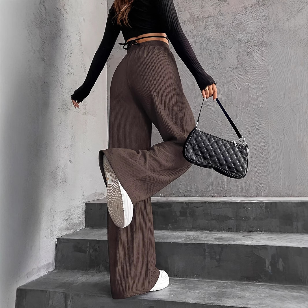 Pantalones largos informales de color liso para mujer, estilo europeo y americano, de corte cruzado, ideales para otoño e invierno de 2024._voghion.com