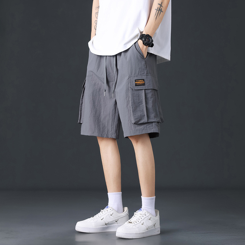 Pantalones cortos de trabajo de seda de hielo para hombres de verano delgados estilo de moda versátil vientos de puerto pantalones casuales deportivos sueltos