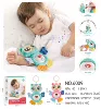 Appeases doll with light music, owl
