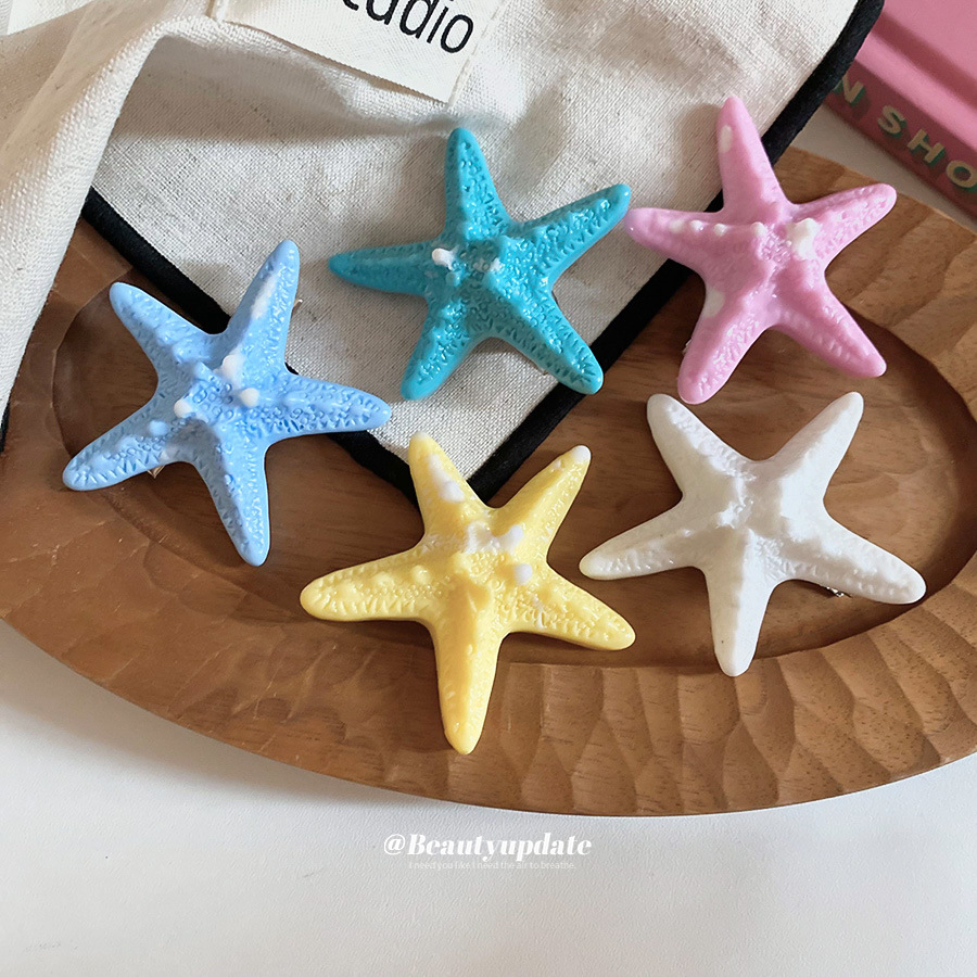 Vacaciones junto al mar viento estrella de mar horquilla moda tendencia de fotografía lateral clip de pico de pato sentido de alta gama accesorios para el cabello de todo fósforo mujeres