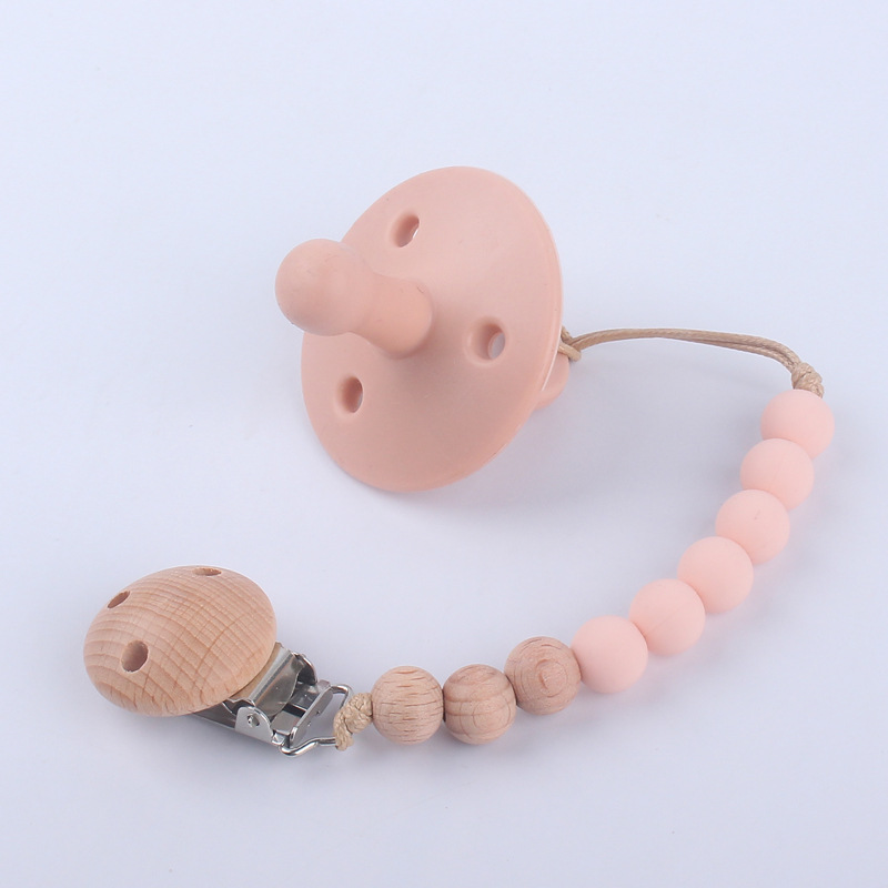 Nuevos suministros para bebés chupete bebé pezón de silicona creativo bebé mordida Cadena de pezón de silicona conjunto de dos piezas