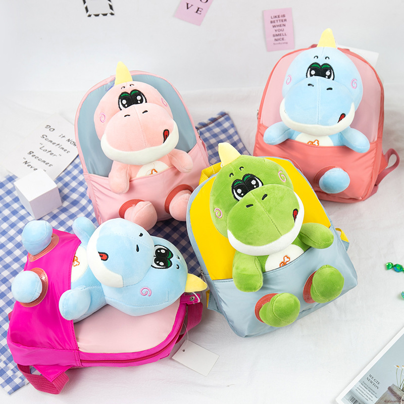 2023 nueva muñeca de dibujos animados desmontable kindergarten mochila de dibujos animados dinosaurio felpa niños bebé mochila