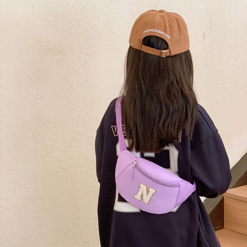 Bolsas coreanas para niños y niñas, bolsas de pecho de color sólido para bebés, 2026 nuevas bolsas de niños transfronterizas