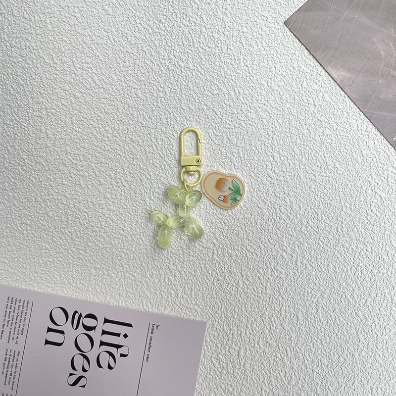 Pequeño Libro Rojo mismo lindo jalea globo láser perro llavero colgante colorido cachorro de dibujos animados teléfono llavero