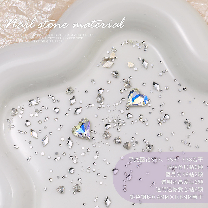Arte de uñas celebridad en línea corazón torcido gema material paquete nuevo K9 cristal de diamante redondo tamaño especial en forma de diamante decoraciones de uñas al por mayor