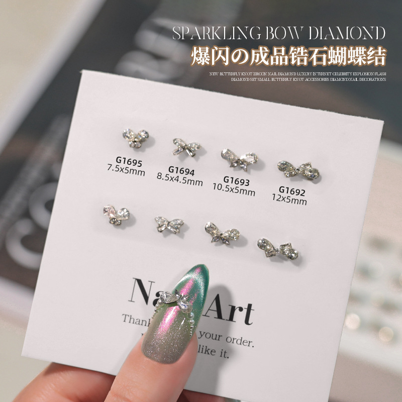 Nuevo estilo bowknot circón manicura de diamantes de lujo celebridades de Internet destellantes pequeños accesorios de lazo joyas de uñas de diamantes al por mayor