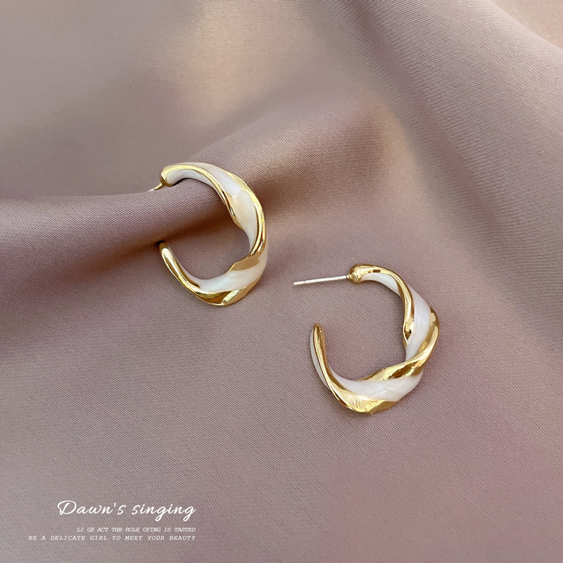 Korean New Retro Earrings Female Simple Personality Twisted Glaze Ring Earrings Wholesale display picture 10