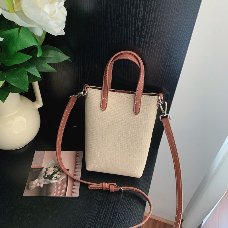 Casual nuevo bolso de verano de mujer inclinado 2026 cubo de hombro portátil versátil bolso pequeño teléfono móvil