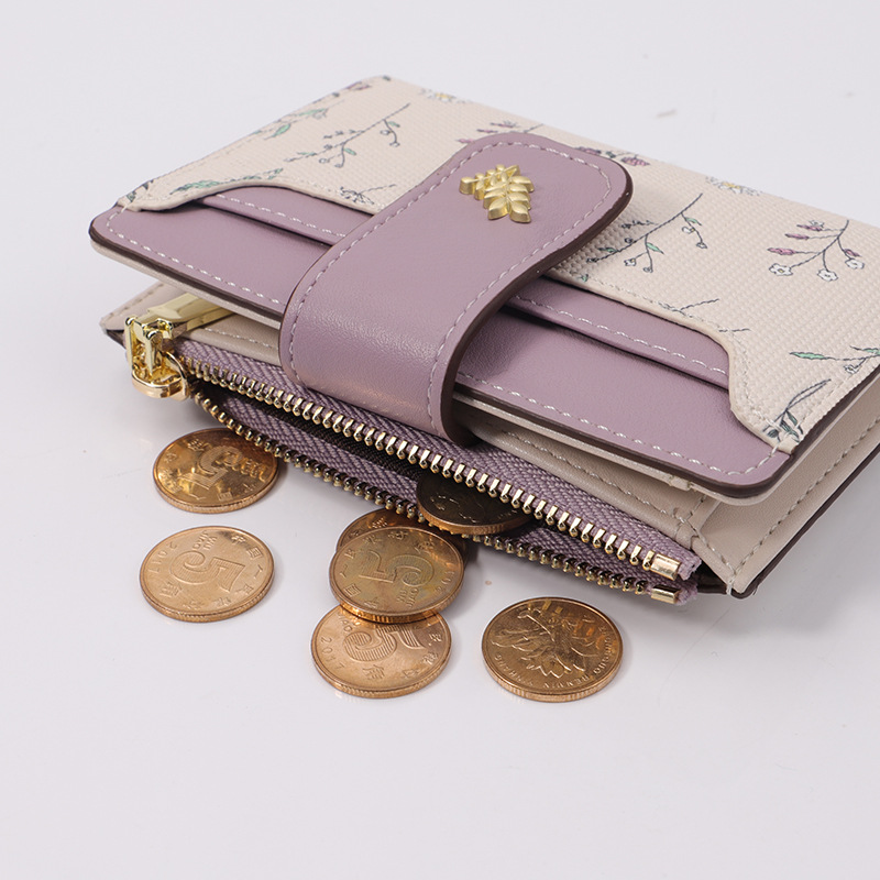 Diseño original de la cartera corta ins mujer versión coreana alta sensación bolso de cambio para estudiantes pequeñas flores frescas bolsa de tarjetas de hierba en uno