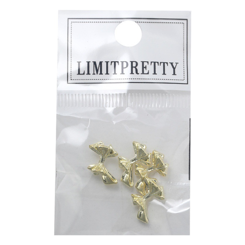 En línea manicura celebridad Fujia Qianjin dragón corazón arco 2023 nueva aleación luz lujo estilo Chanel decoraciones de uñas